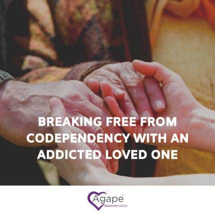 Two people holding hands, text reads 'Breaking Free from Codependency with an Addicted Loved One', Agape logo below.