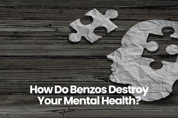 Puzzle piece forming a head on wood background with text How Do Benzos Destroy Your Mental Health?