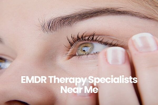 Person close-up touching face, text overlay EMDR Therapy Specialists Near Me.