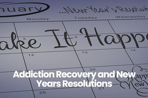 Calendar page with 'Make It Happen' written for January featuring New Year's resolutions theme.