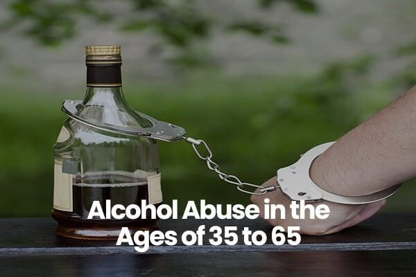 Bottle of alcohol chained to a person's wrist with handcuffs.