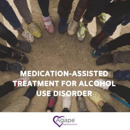 Circle of people's feet in colorful shoes on sandy ground, text overlay Medication-Assisted Treatment for Alcohol Use Disorder.