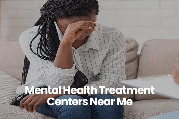 Person in striped shirt sitting on a couch, hand on forehead, text overlay reads Mental Health Treatment Centers Near Me.