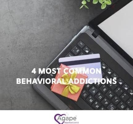 Laptop keyboard with credit cards and text 4 Most Common Behavioral Addictions.