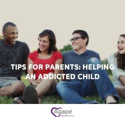 Group of people sitting on grass, smiling, with text overlay Tips for Parents: Helping an Addicted Child.