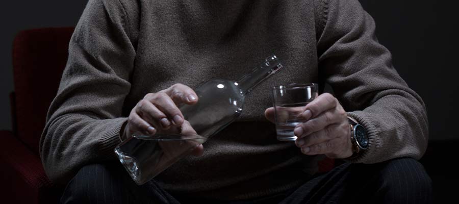 What Are The Symptoms of a Person Suffering From Alcoholism?