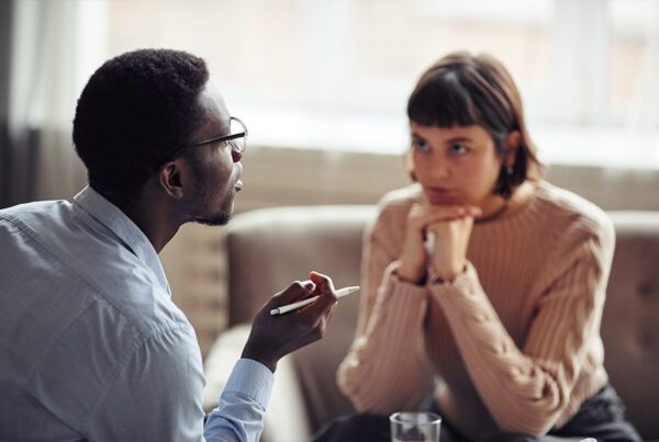 therapist in session with addiction recovery patient