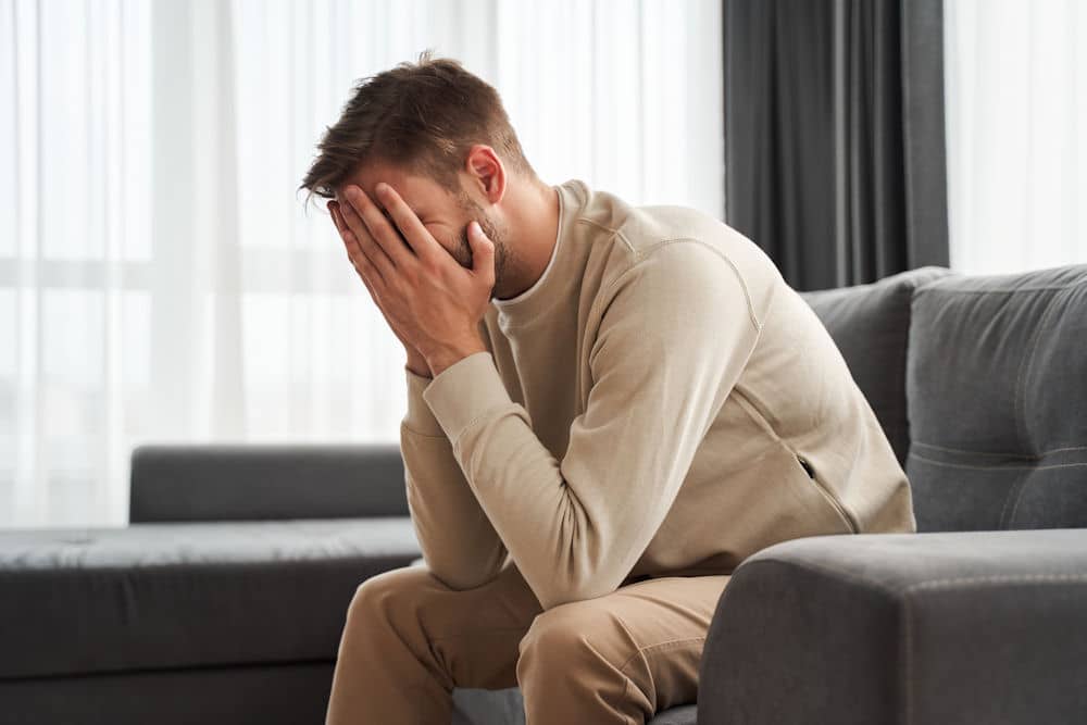 man suffering from sleeping pill symptoms